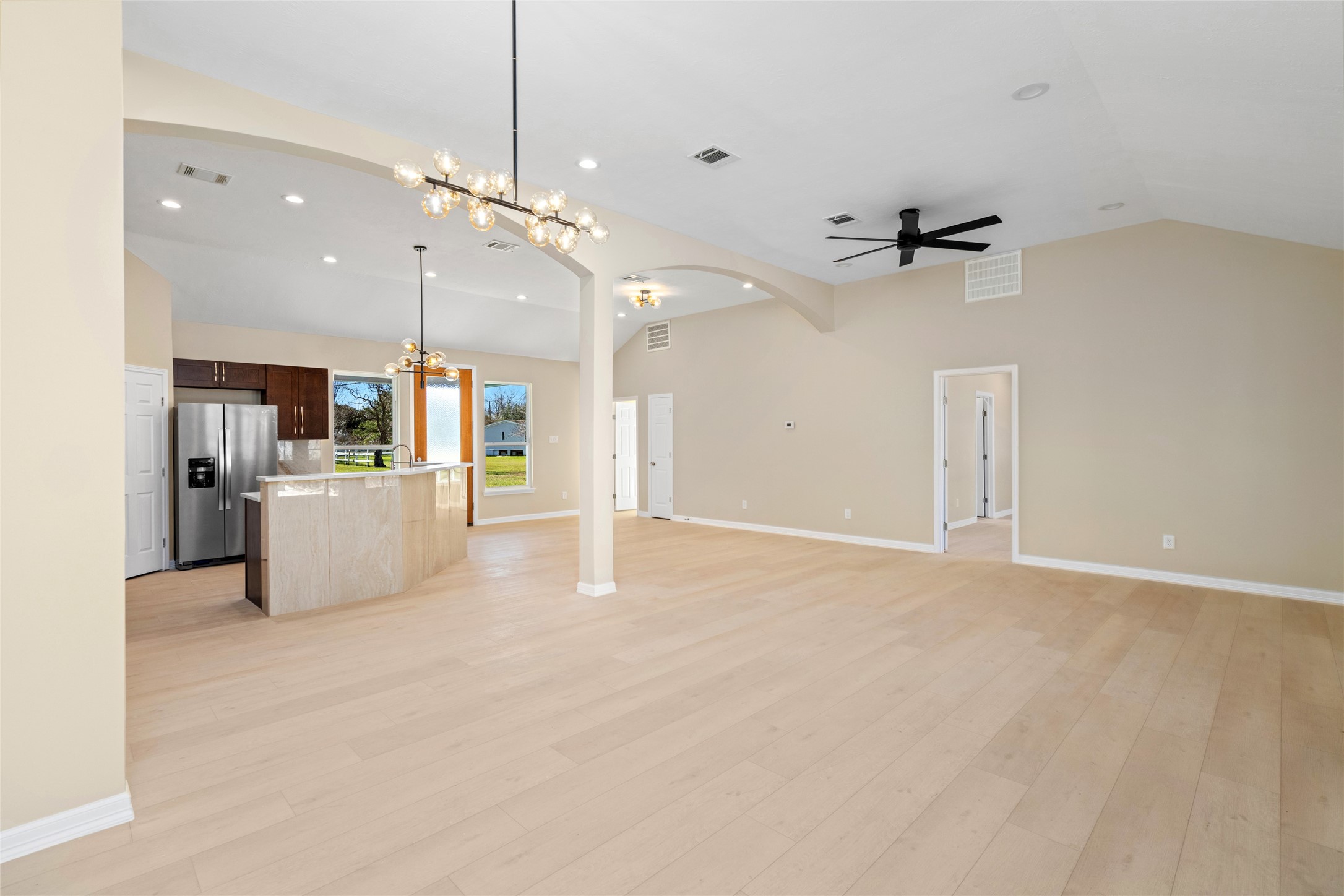 4654 North Teague Street Rosharon, TX 77583 - Photo 7 of 46 A welcoming close-up of the
front door reveals highquality finishes, stylish
lighting, and an inviting
entryway that sets the tone
for the luxury inside.