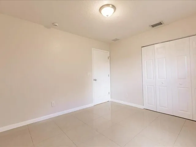 an empty room with an entryway