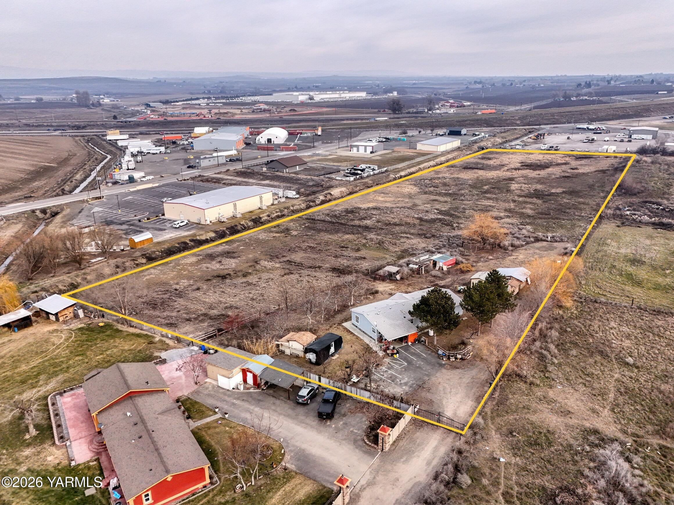 1383 Puterbaugh Road Grandview, WA 98930 - Photo 16 of 19 an aerial view of residential houses with outdoor space