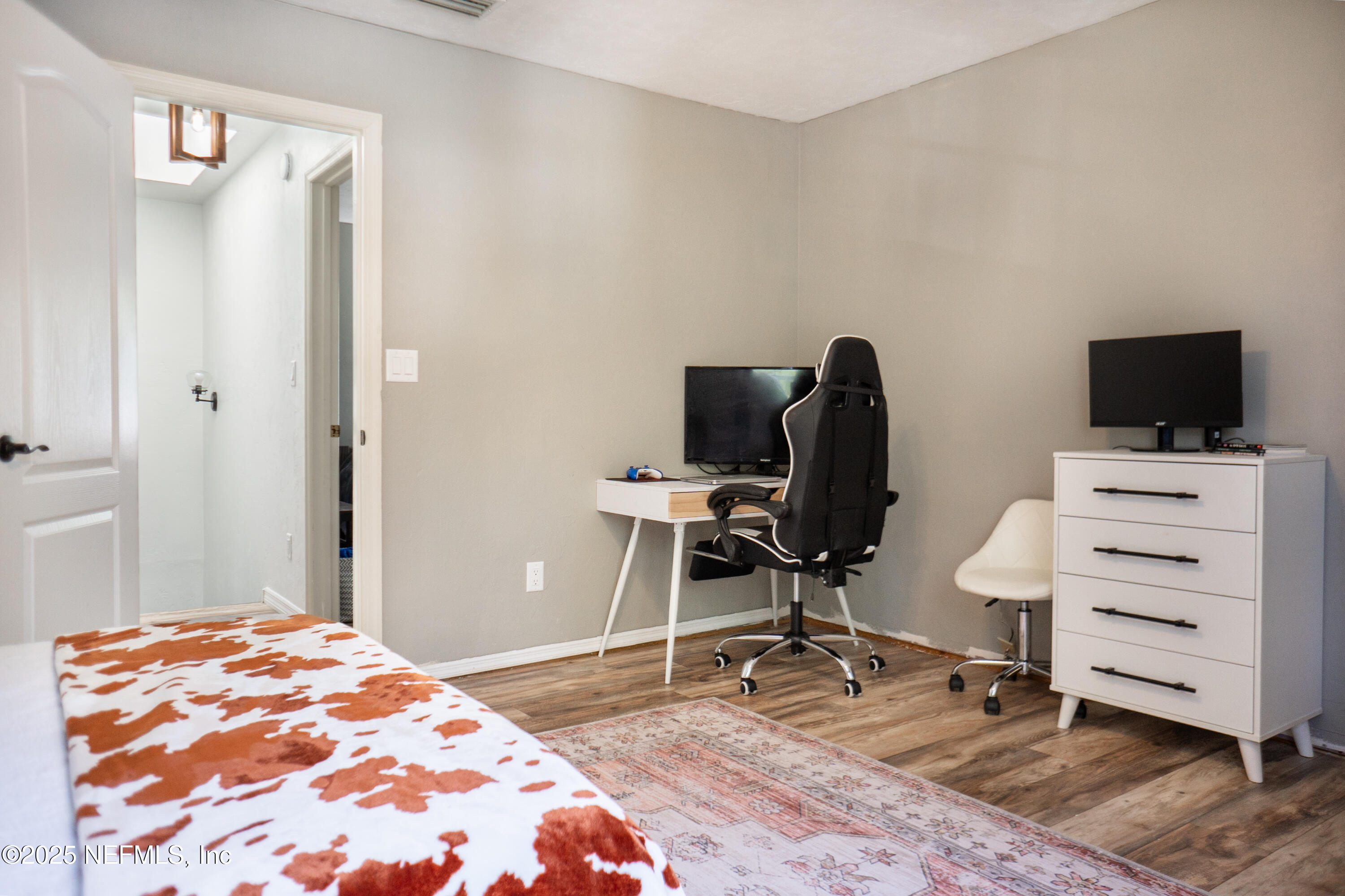 2380 Southeast 43rd Street Keystone Heights, FL 32656 - Photo 29 of 61 a bedroom with a workspace