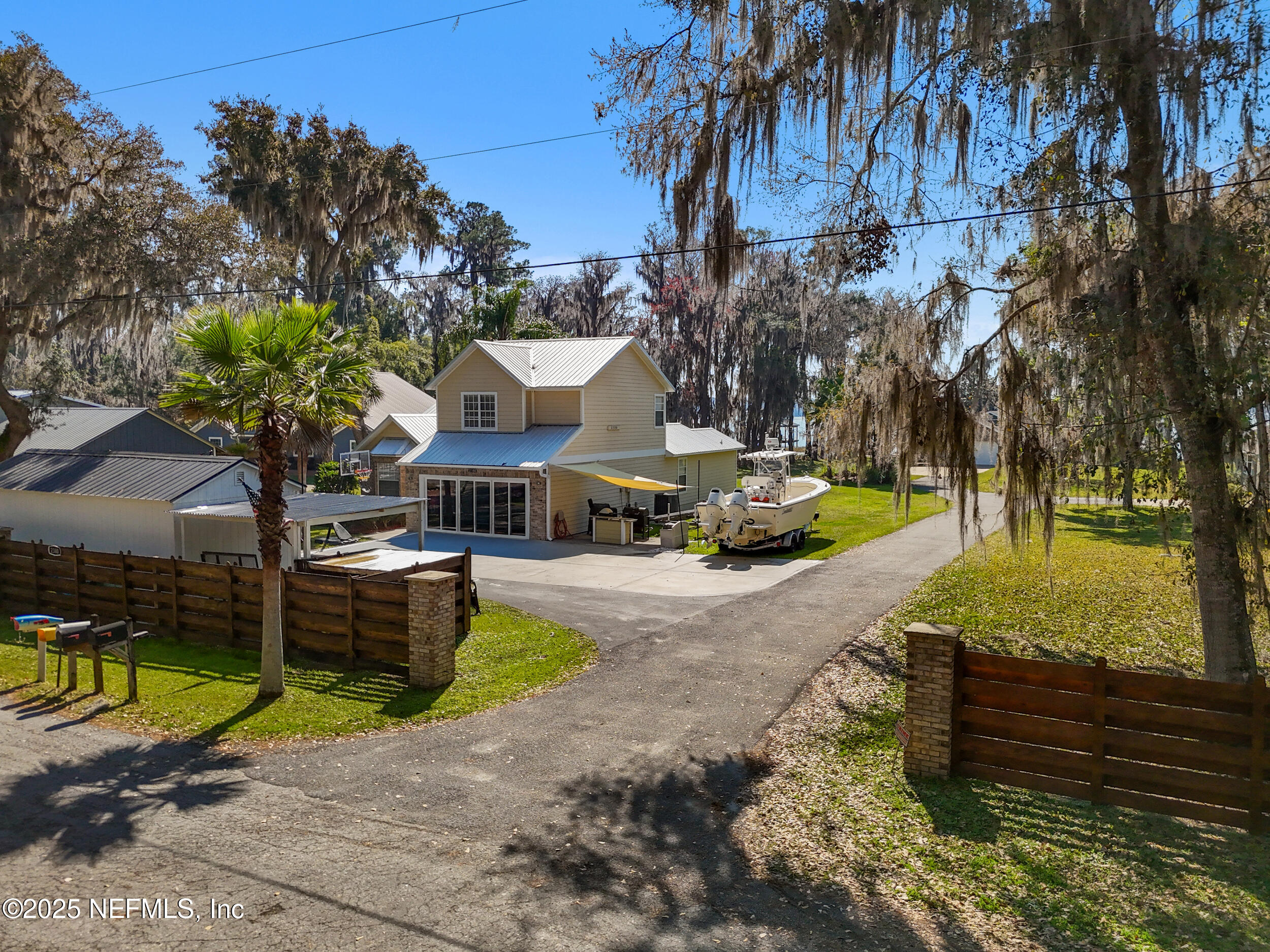 2380 Southeast 43rd Street Keystone Heights, FL 32656 - Photo 42 of 61 a view of a house with pool and sitting area
