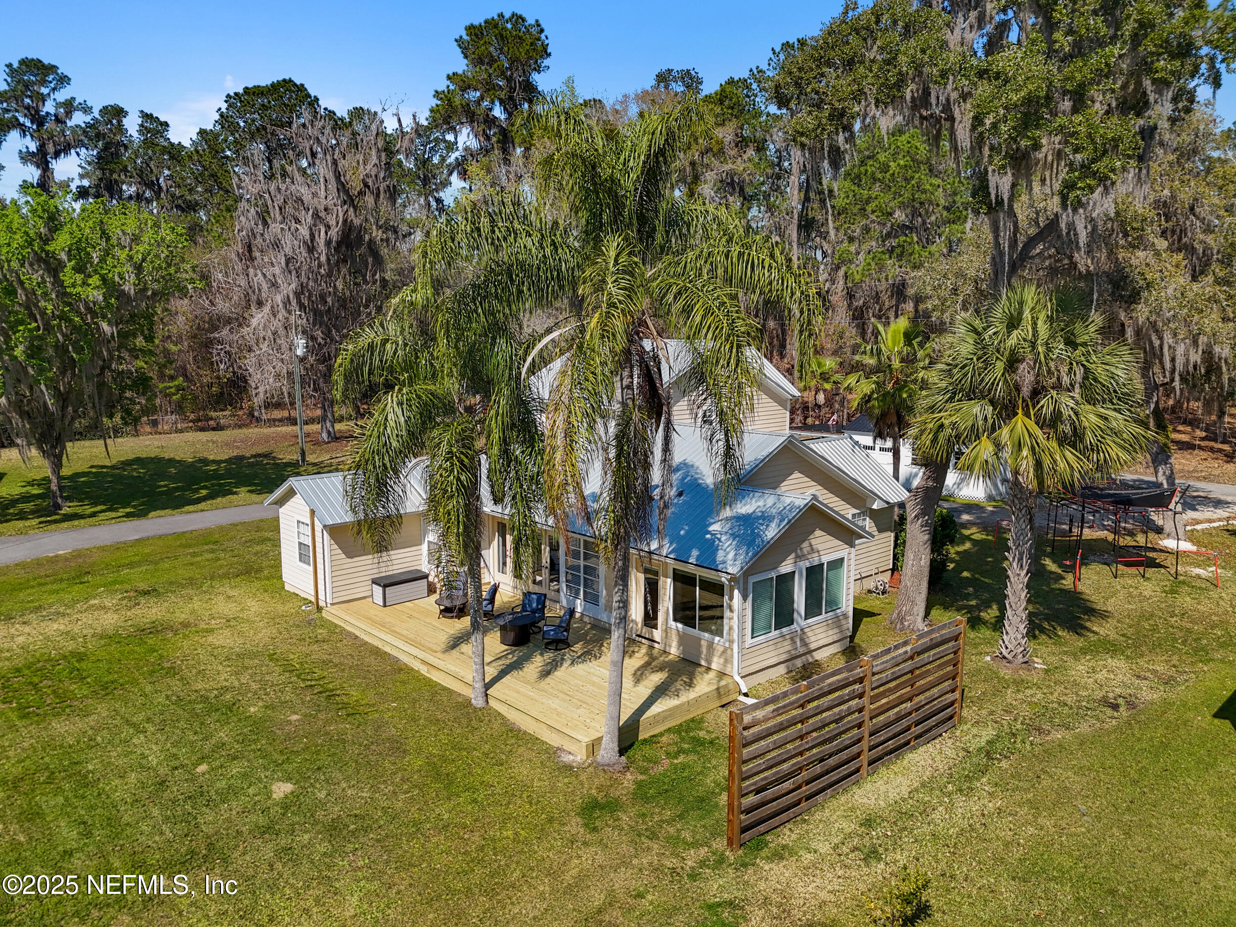 2380 Southeast 43rd Street Keystone Heights, FL 32656 - Photo 43 of 61 a front view of a house with garden