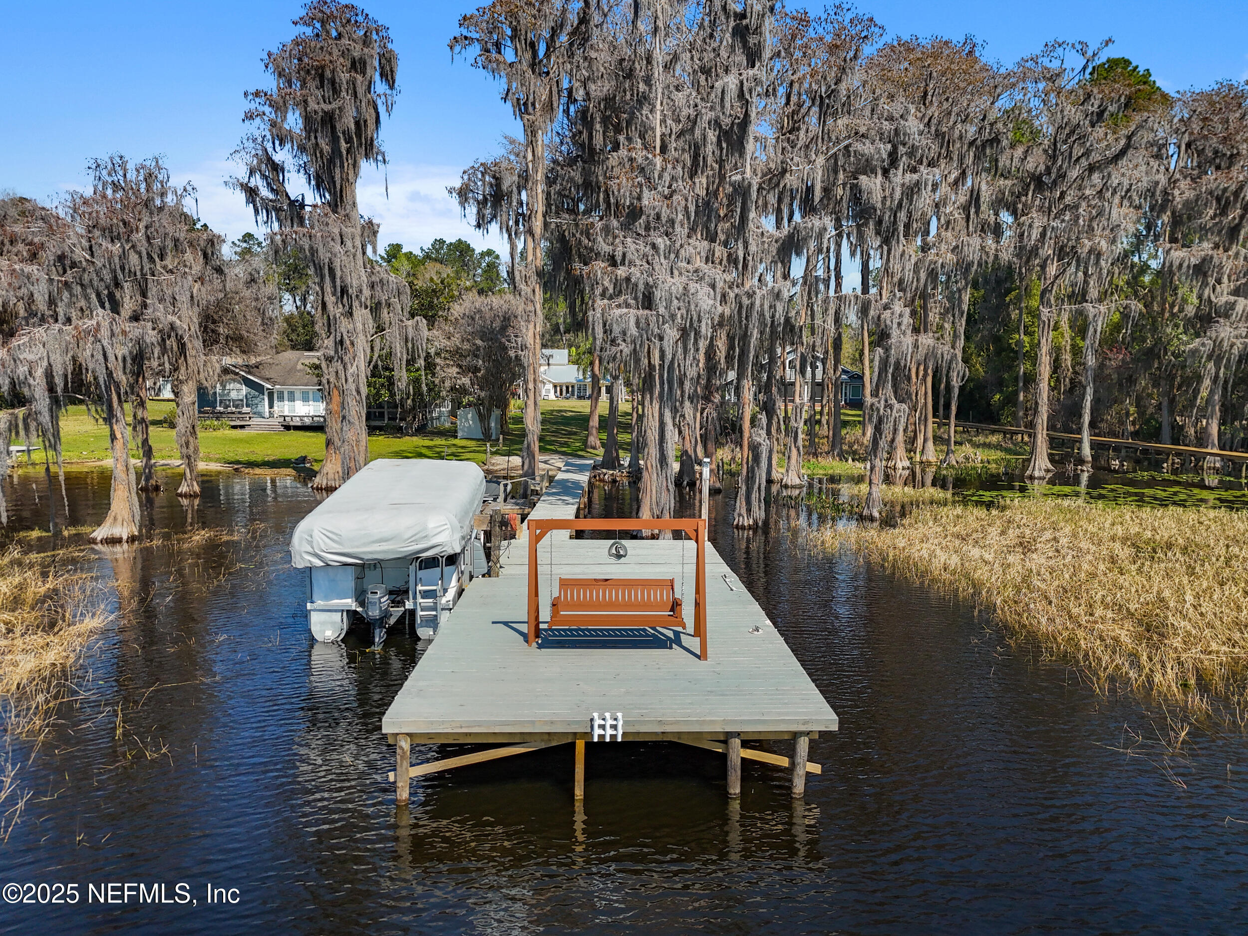2380 Southeast 43rd Street Keystone Heights, FL 32656 - Photo 57 of 61 a swimming pool view with a seating space