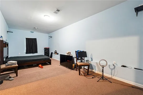 a view of a livingroom with wooden floor