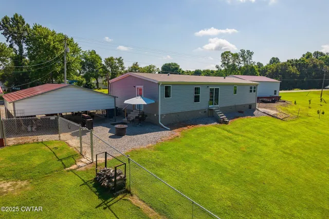 a view of an outdoor space with swimming pool