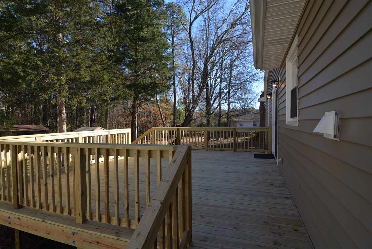 5317 Revere Road Durham, NC 27713 - Photo 15 of 19 a view of a balcony with wooden floor