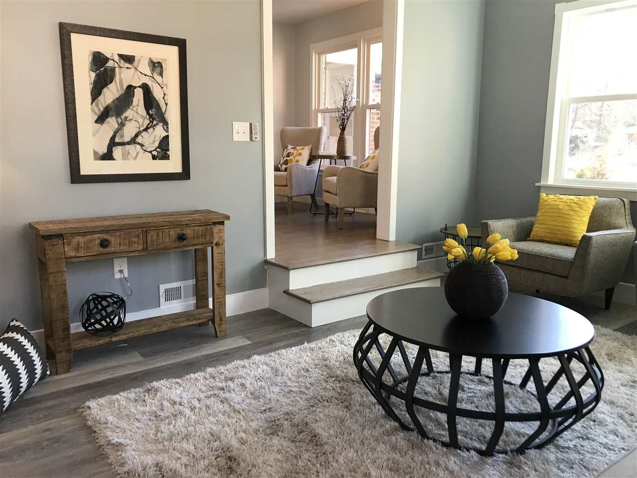 5317 Revere Road Durham, NC 27713 - Photo 10 of 19 a living room with furniture and a fireplace