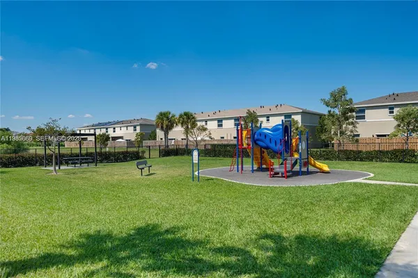 a view of a park with swings