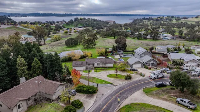 an aerial view of a house with outdoor space