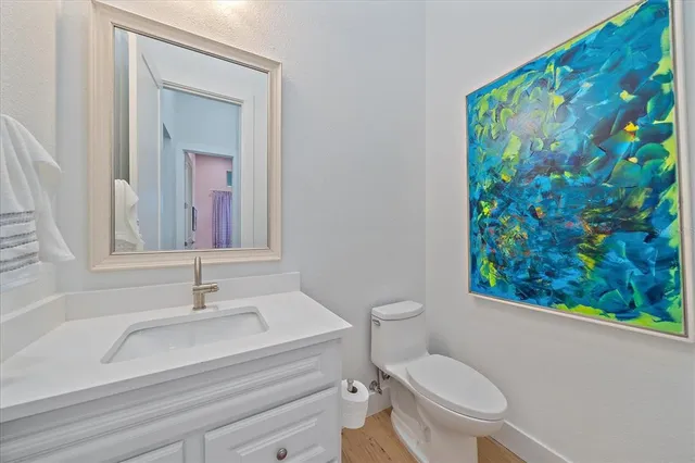 a bathroom with a sink and a window