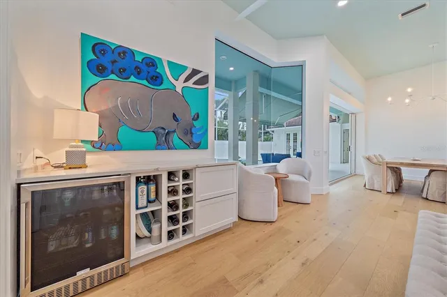 a swimming pool with outdoor seating and yard