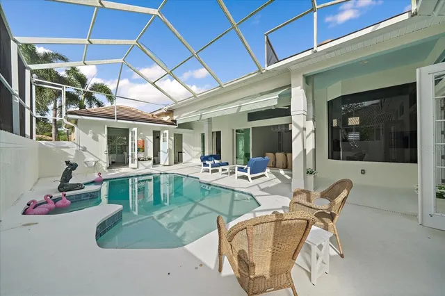 an aerial view of a house with a outdoor space