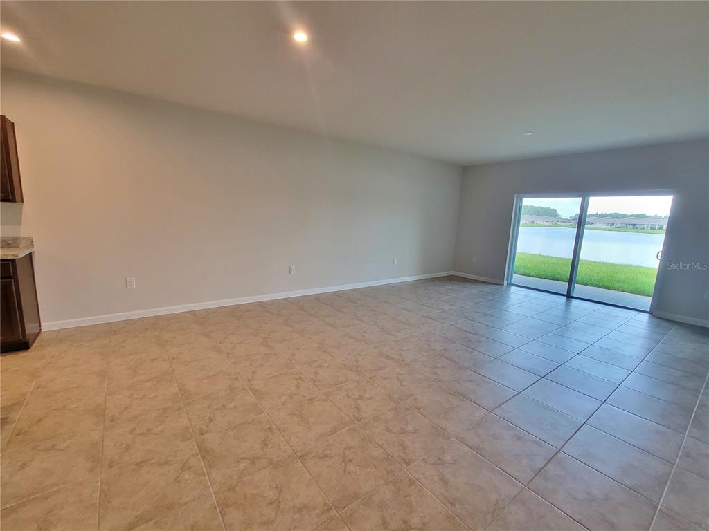 18008 Turning Leaf Circle Land O Lakes, FL 34638 - Photo 11 of 54 an empty room with window