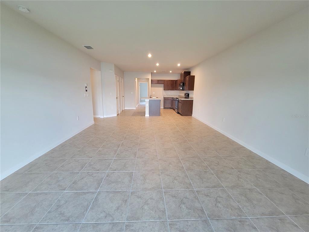 18008 Turning Leaf Circle Land O Lakes, FL 34638 - Photo 14 of 54 a view of a kitchen with a sink