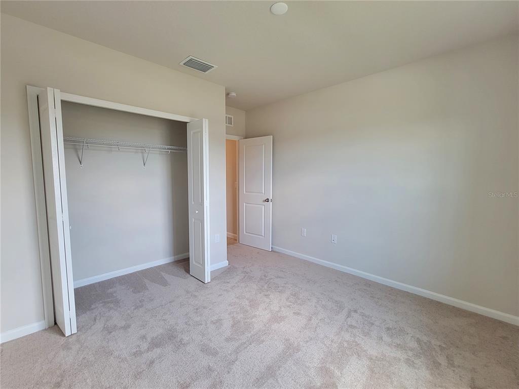 18008 Turning Leaf Circle Land O Lakes, FL 34638 - Photo 36 of 54 a view of an empty room