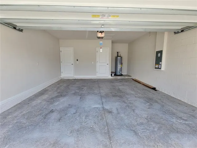 a view of a house with backyard and porch