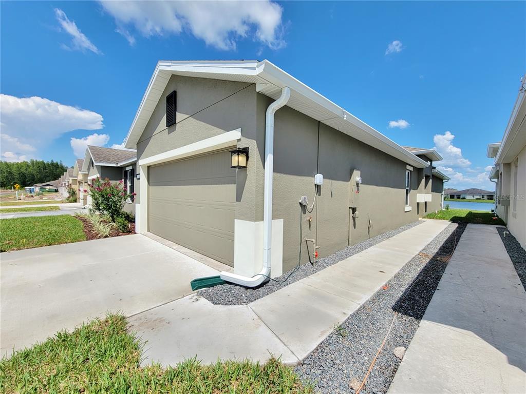 18008 Turning Leaf Circle Land O Lakes, FL 34638 - Photo 5 of 54 a view of a house with a yard
