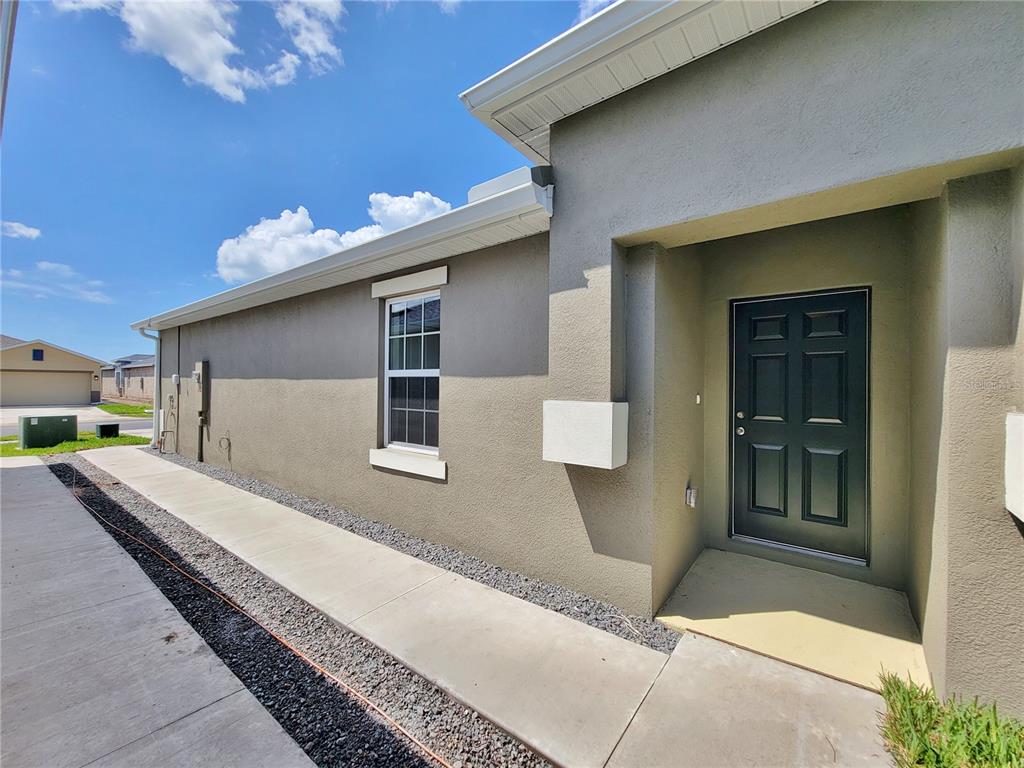 18008 Turning Leaf Circle Land O Lakes, FL 34638 - Photo 6 of 54 a house view with a outdoor space