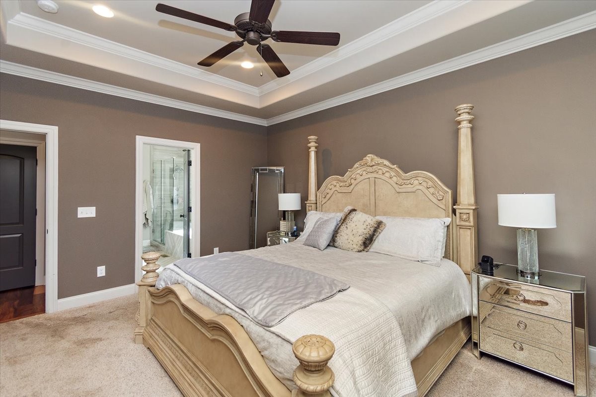 525 Piccadilly Drive Murfreesboro, TN 37128 - Photo 19 of 44 a bedroom with a bed and a lamp