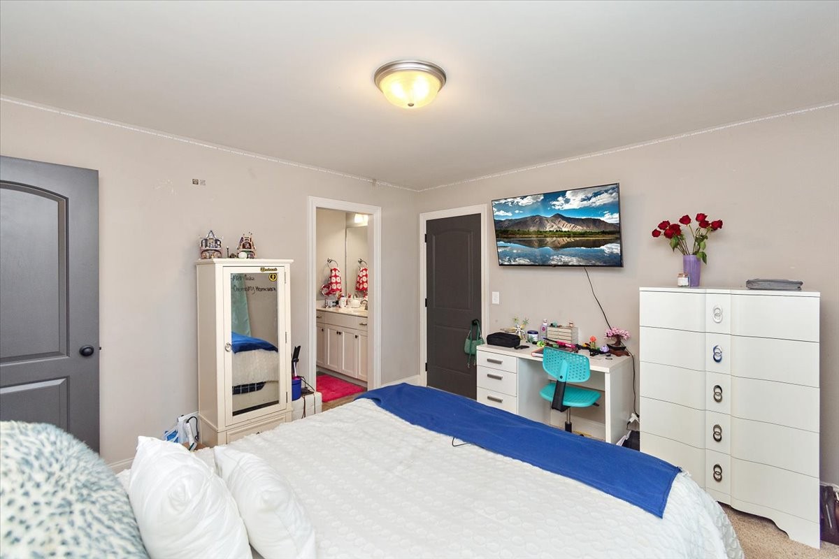 525 Piccadilly Drive Murfreesboro, TN 37128 - Photo 36 of 44 a bedroom with a bed and furniture