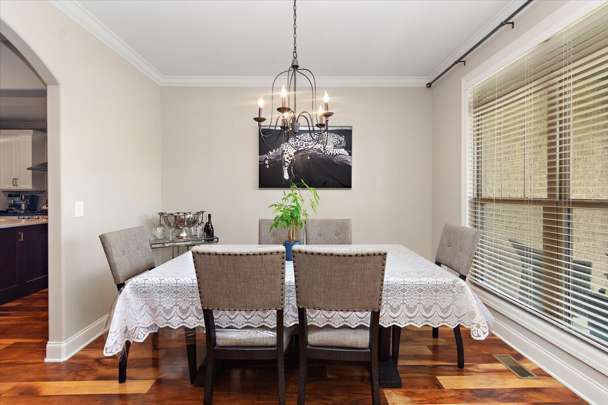 525 Piccadilly Drive Murfreesboro, TN 37128 - Photo 8 of 44 a view of a dining room with furniture window and wooden floor