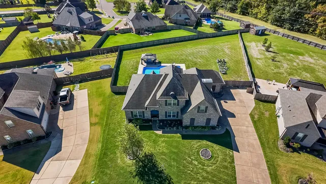 a view of an chairs and umbrellas in the balcony