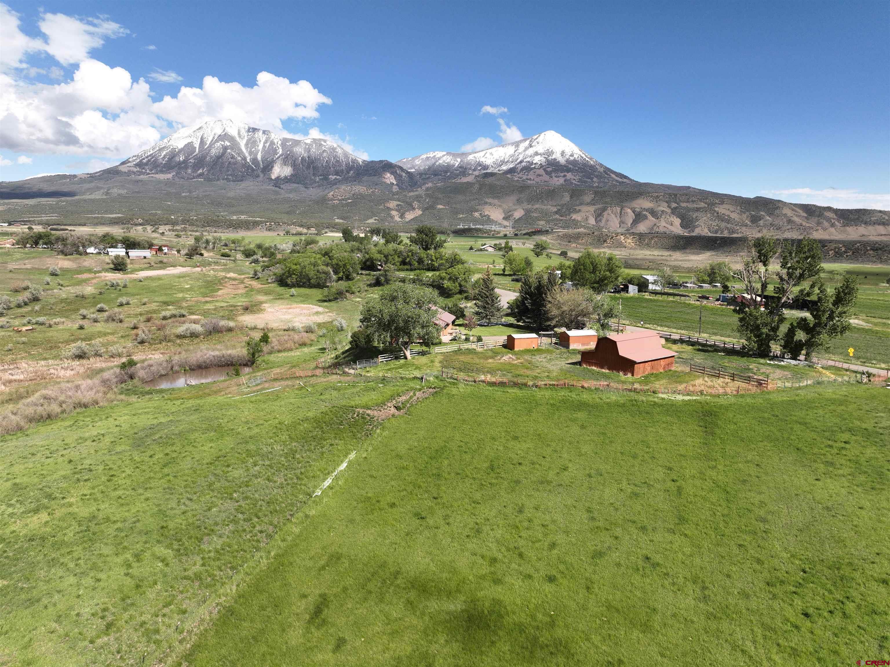 11253 Crawford Road Paonia, CO 81428 - Photo 25 of 44 a view of a town with mountains in the background