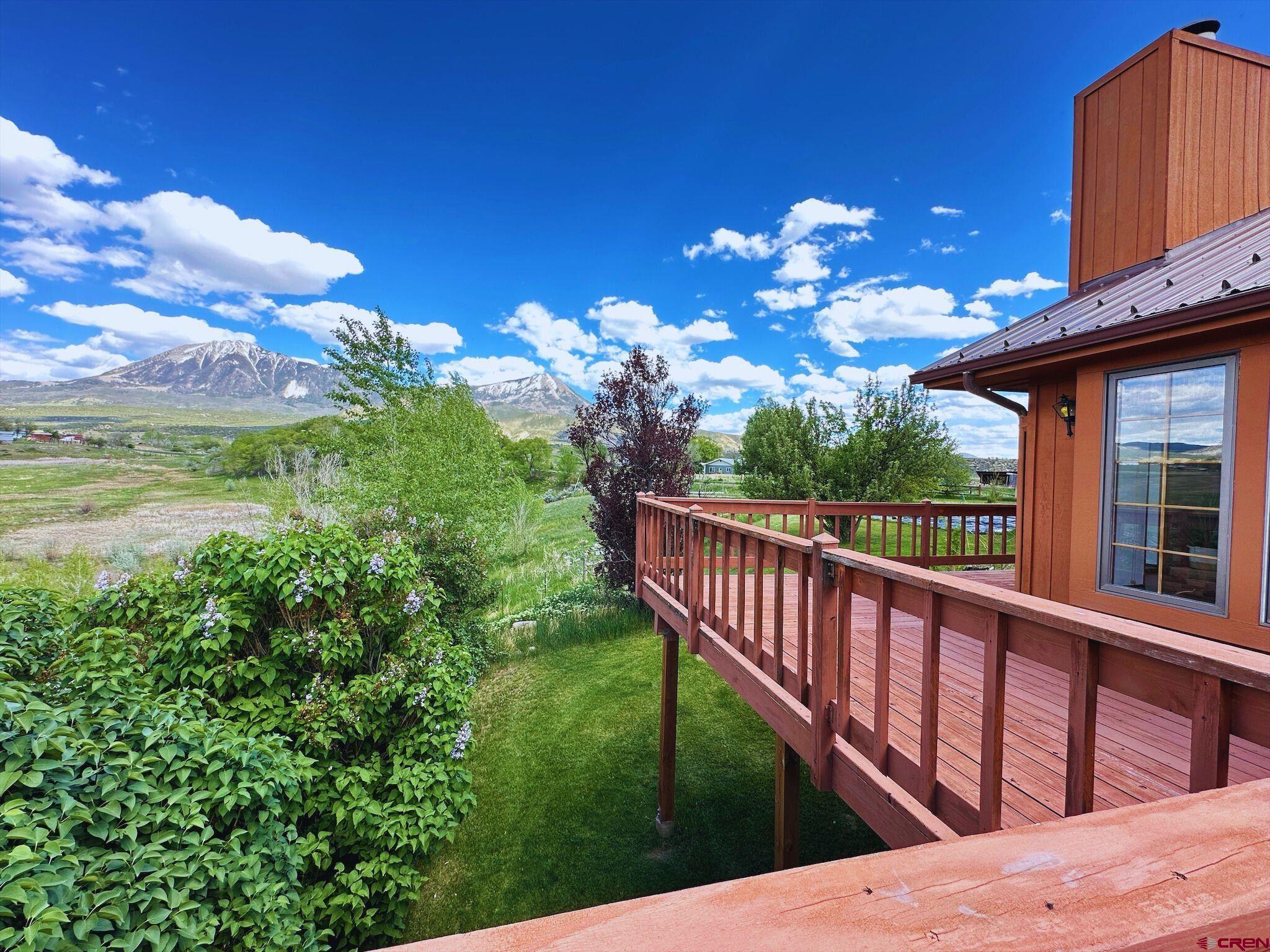 11253 Crawford Road Paonia, CO 81428 - Photo 31 of 44 a view of a balcony with dining space