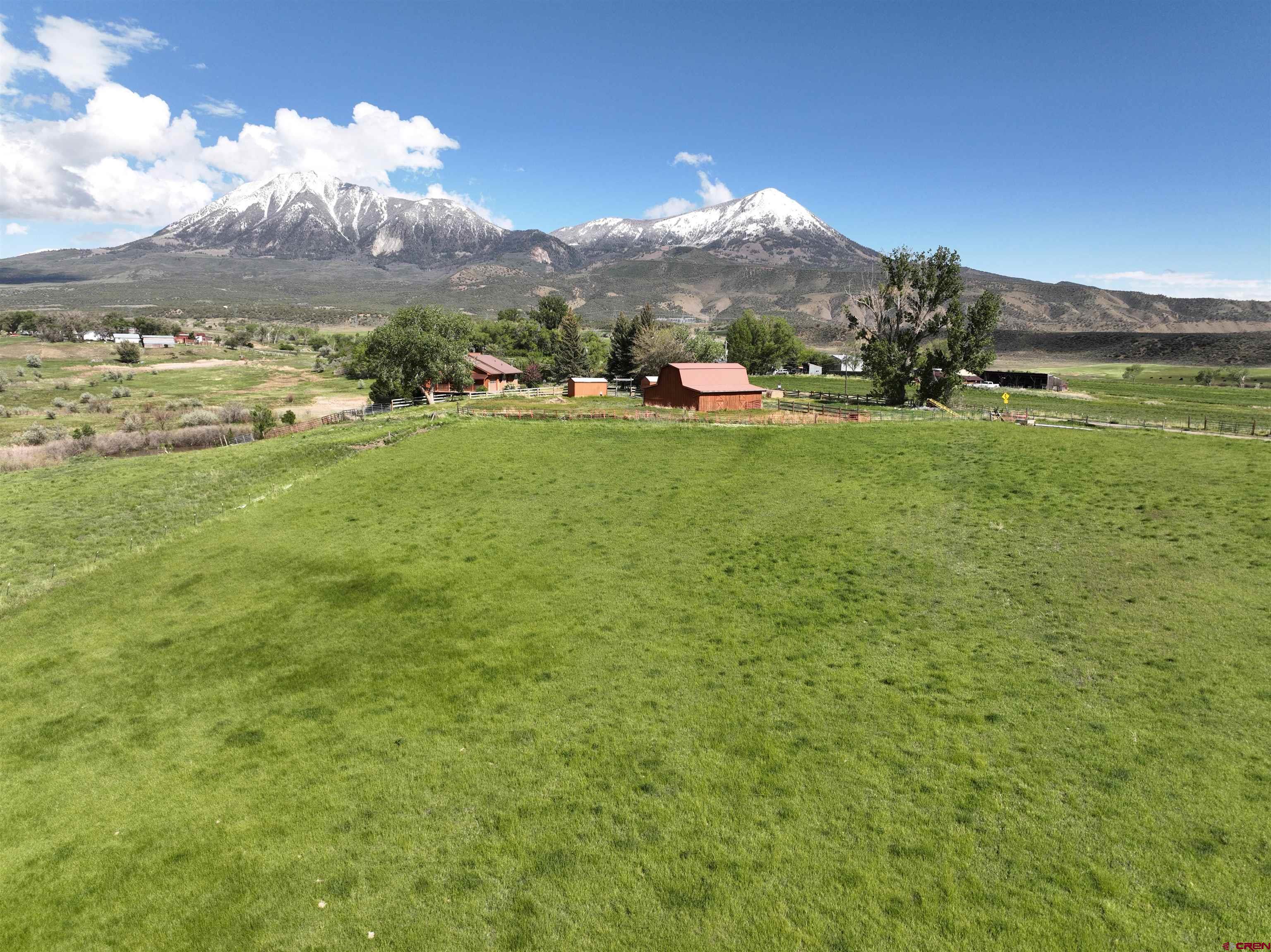 11253 Crawford Road Paonia, CO 81428 - Photo 33 of 44 a view of a town with mountains in the background