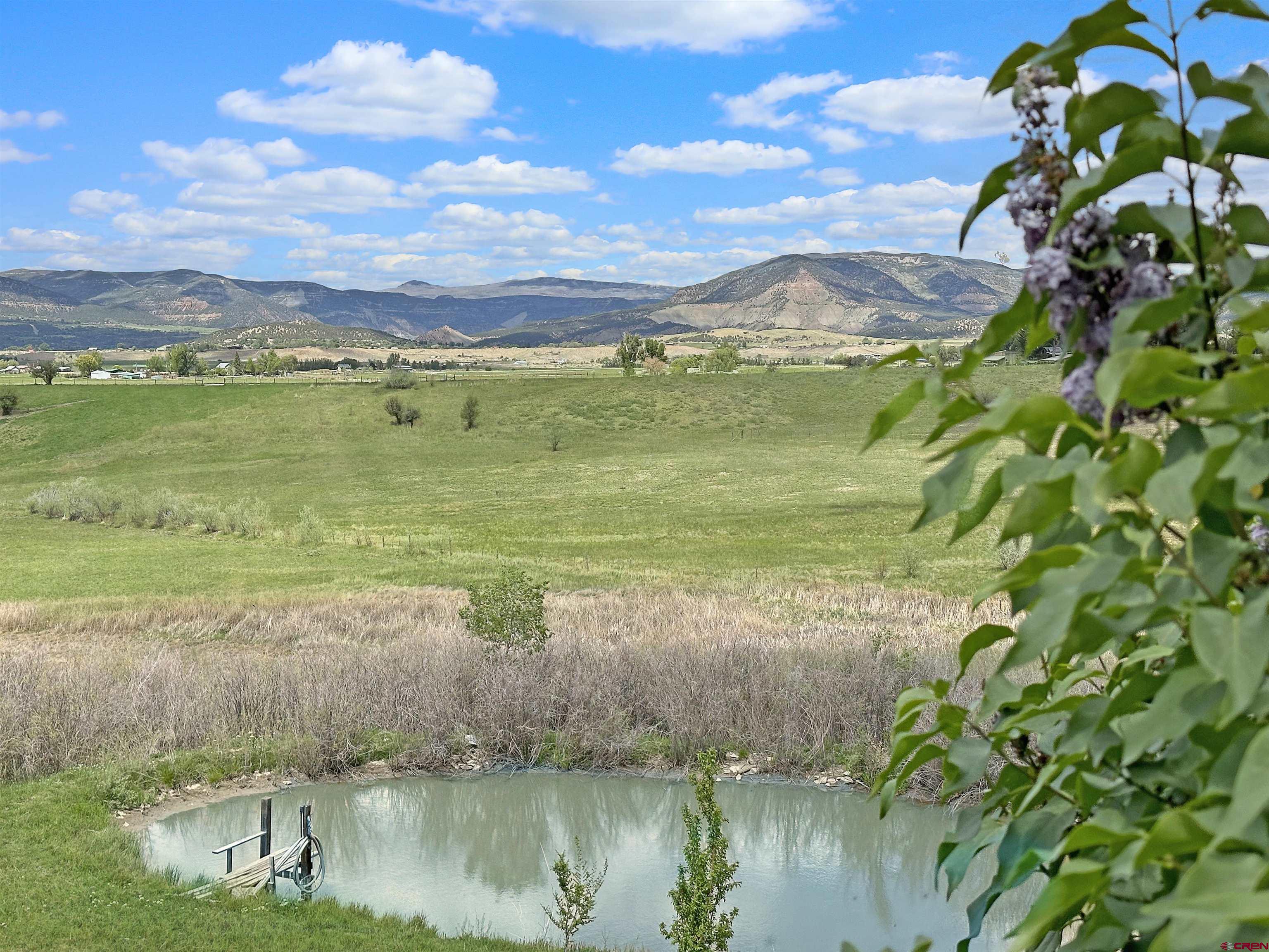 11253 Crawford Road Paonia, CO 81428 - Photo 34 of 44 a view of a lake with a city
