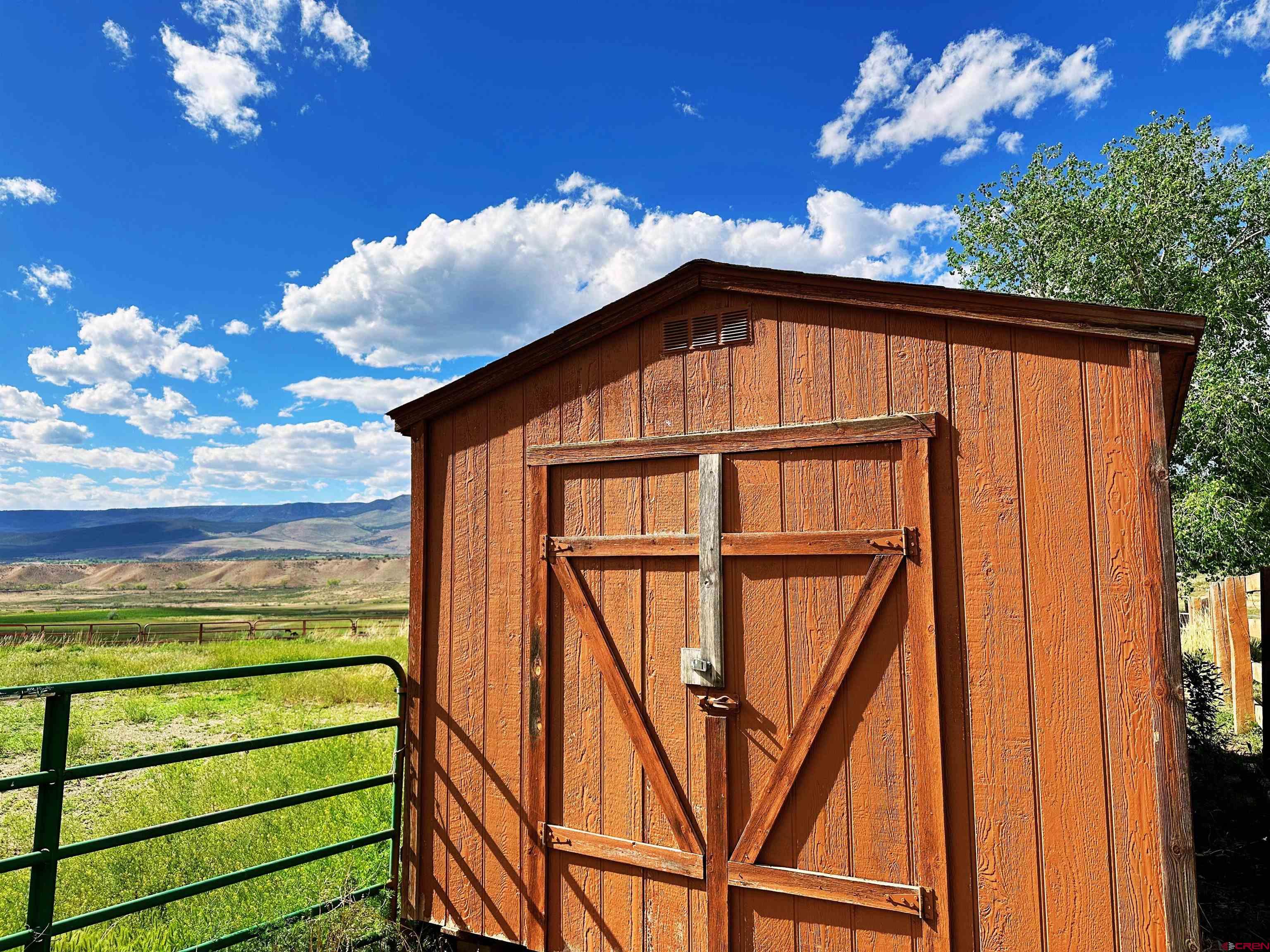 11253 Crawford Road Paonia, CO 81428 - Photo 37 of 44 a front view of a house with a yard