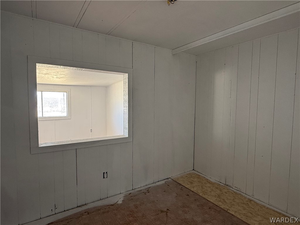 8051 7th Street Dolan Springs, AZ 86441 - Photo 29 of 65 an empty room with a window