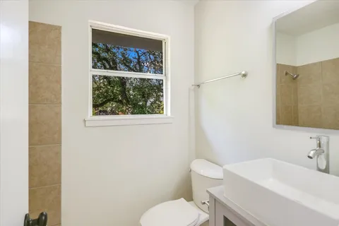 a bathroom with a sink and a toilet