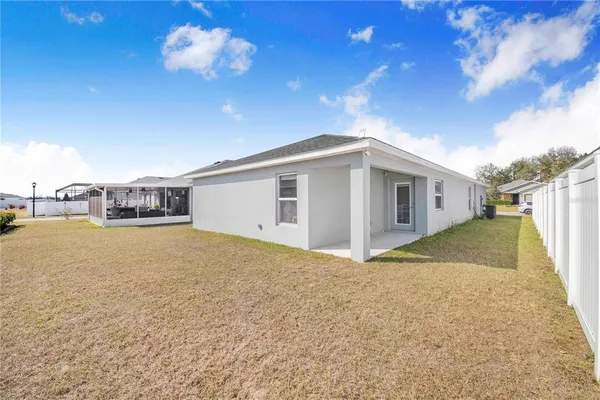 a front view of house with a yard and garage
