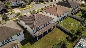 an aerial view of a house with a front door
