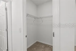 a view of a big yard with a fountain and a big yard