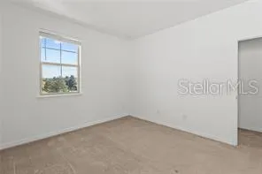 a view of a house with backyard and garden