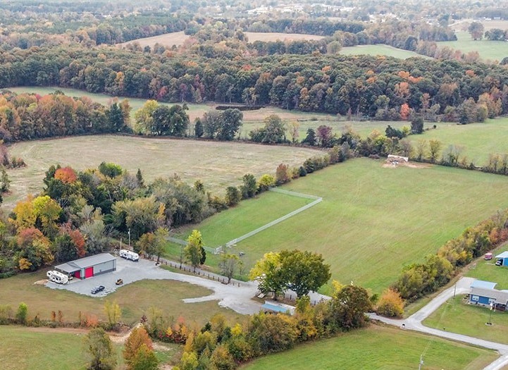 320 Capps Farm Lane McEwen, TN 37101 - Photo 1 of 16 a view of a lake with a houses