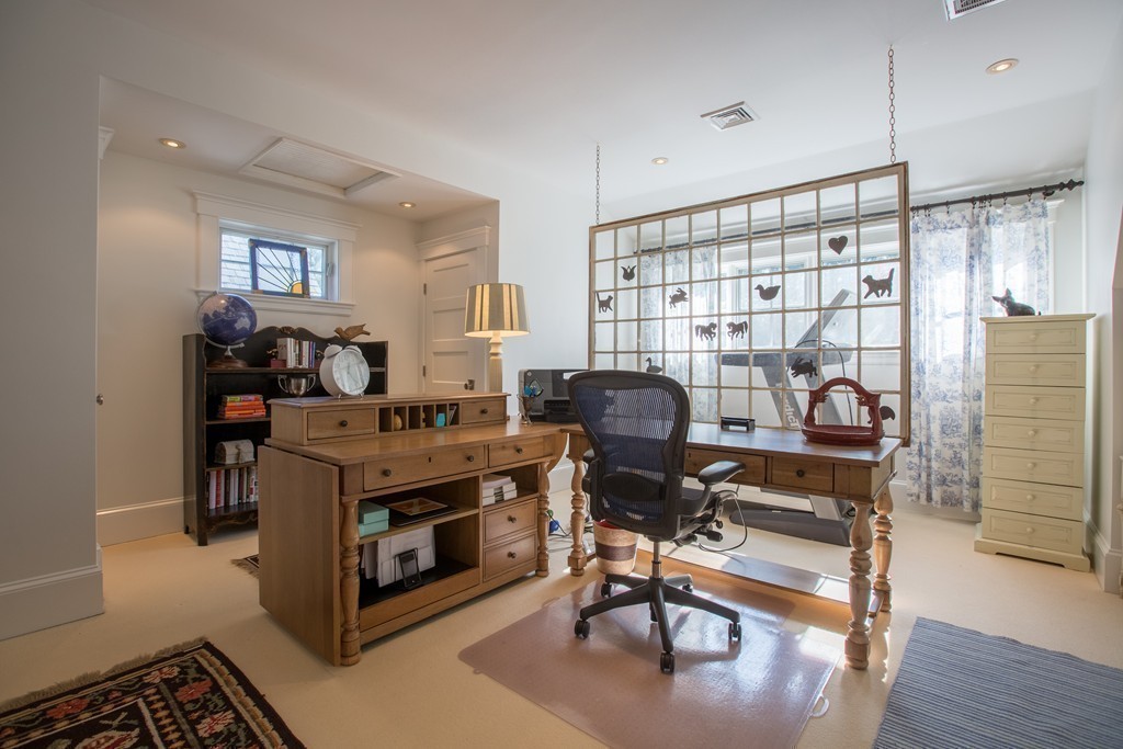 350 Musketaquid Road Concord, MA 01742 - Photo 15 of 24 a view of a workspace with furniture and a livingroom