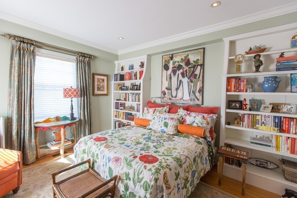 350 Musketaquid Road Concord, MA 01742 - Photo 20 of 24 a bedroom with a bed and a book shelf
