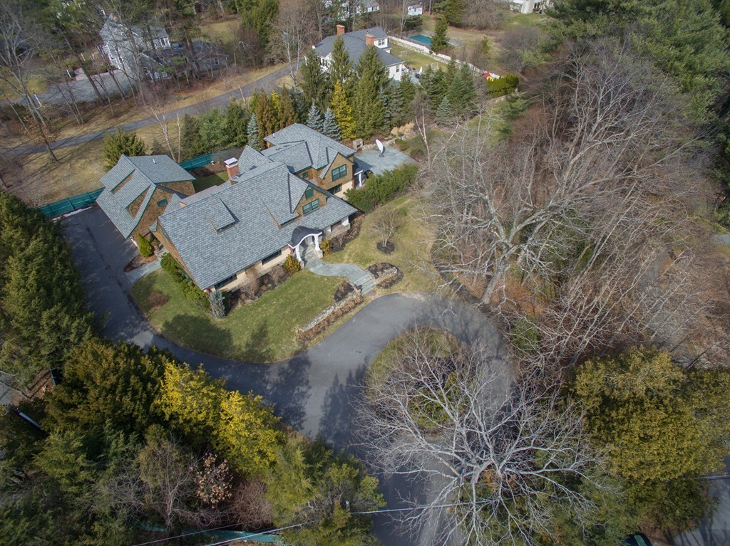 350 Musketaquid Road Concord, MA 01742 - Photo 2 of 24 an aerial view of a house with a yard
