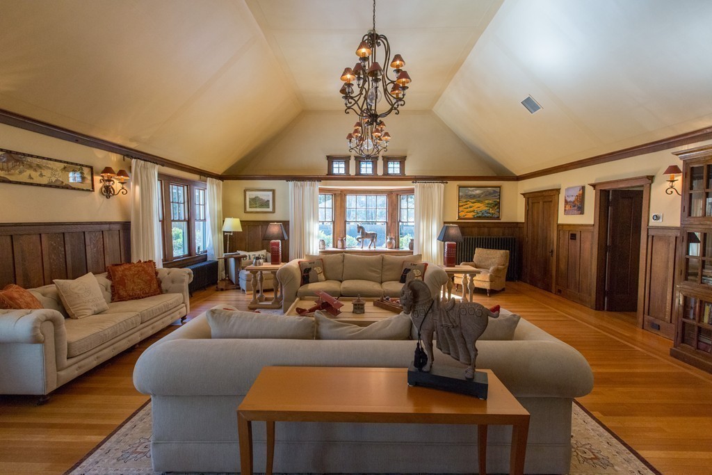 350 Musketaquid Road Concord, MA 01742 - Photo 4 of 24 a living room with furniture a chandelier and a window