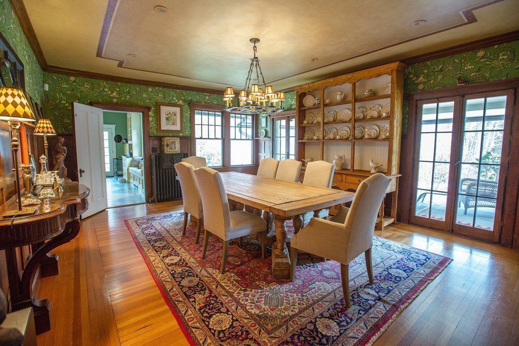 350 Musketaquid Road Concord, MA 01742 - Photo 6 of 24 a dining room with furniture a chandelier and wooden floor