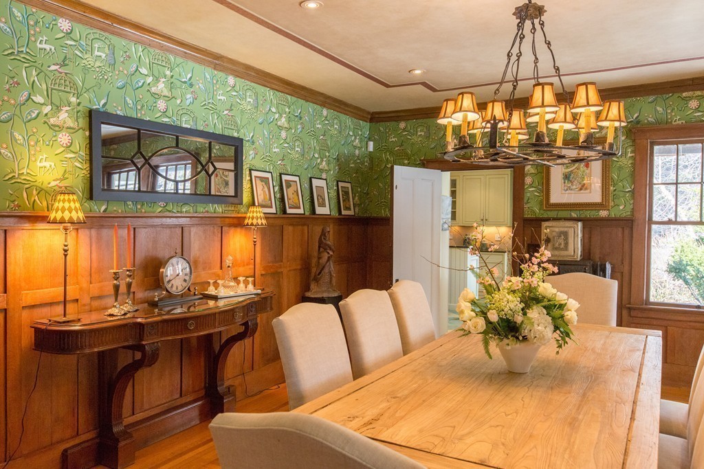 350 Musketaquid Road Concord, MA 01742 - Photo 7 of 24 a dining room filled with furniture and chandelier