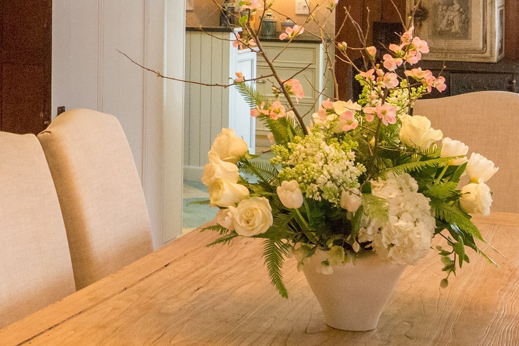 350 Musketaquid Road Concord, MA 01742 - Photo 8 of 24 a vase of flowers sitting on a table