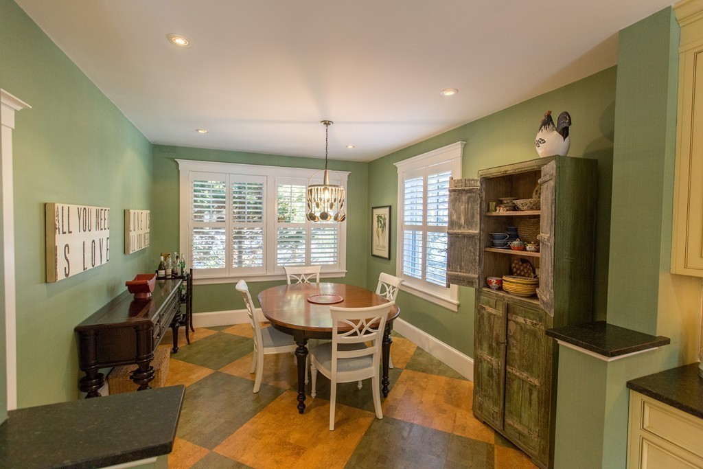 350 Musketaquid Road Concord, MA 01742 - Photo 10 of 24 a dining room with furniture a chandelier and wooden floor