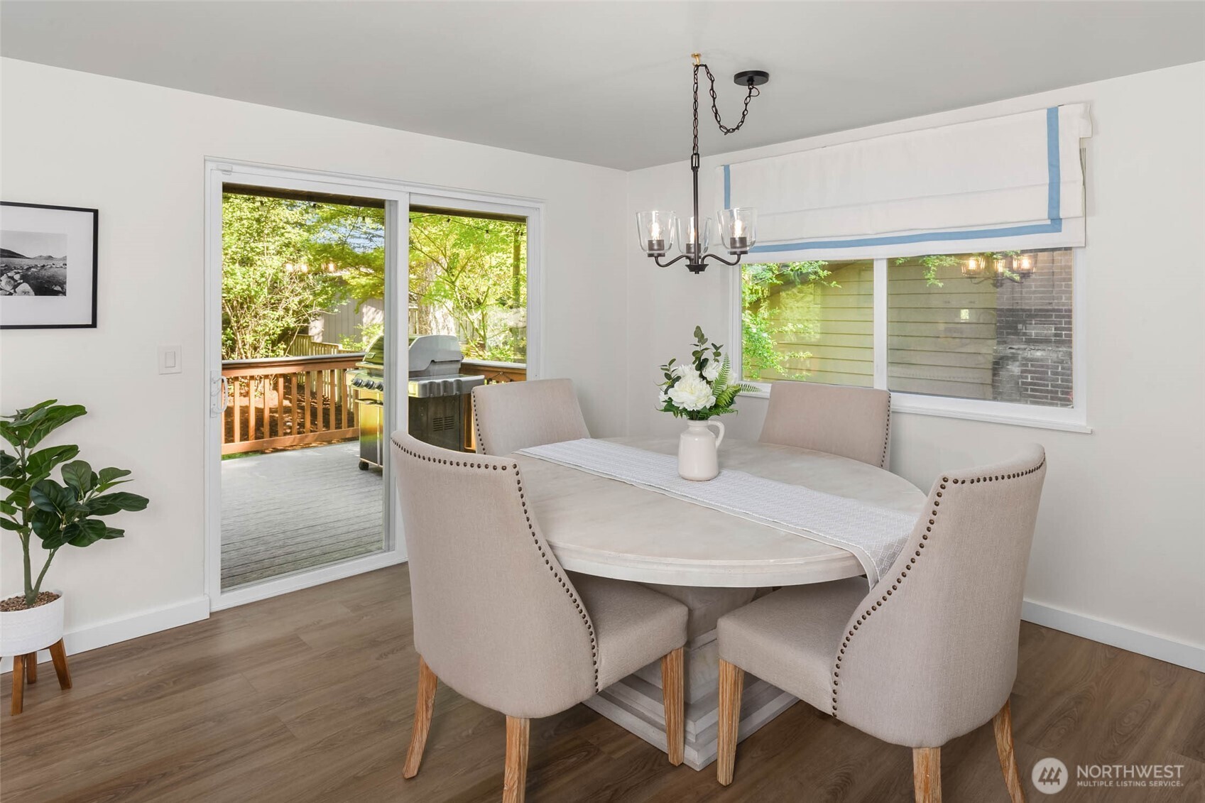 11019 23rd Drive Southeast Everett, WA 98208 - Photo 15 of 35 a view of a dining room with furniture window and wooden floor