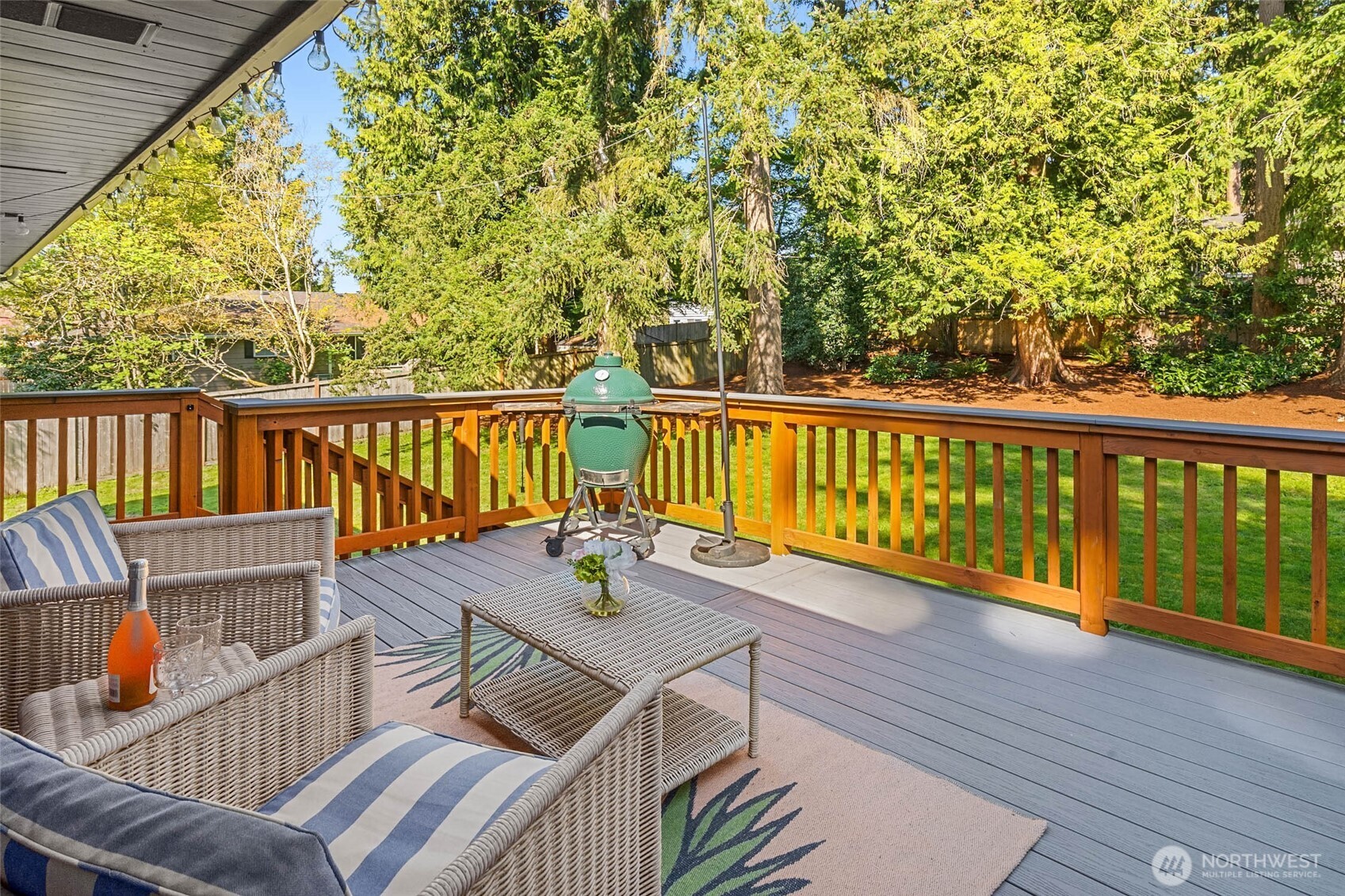 11019 23rd Drive Southeast Everett, WA 98208 - Photo 16 of 35 a view of a balcony with wooden floor and outdoor seating