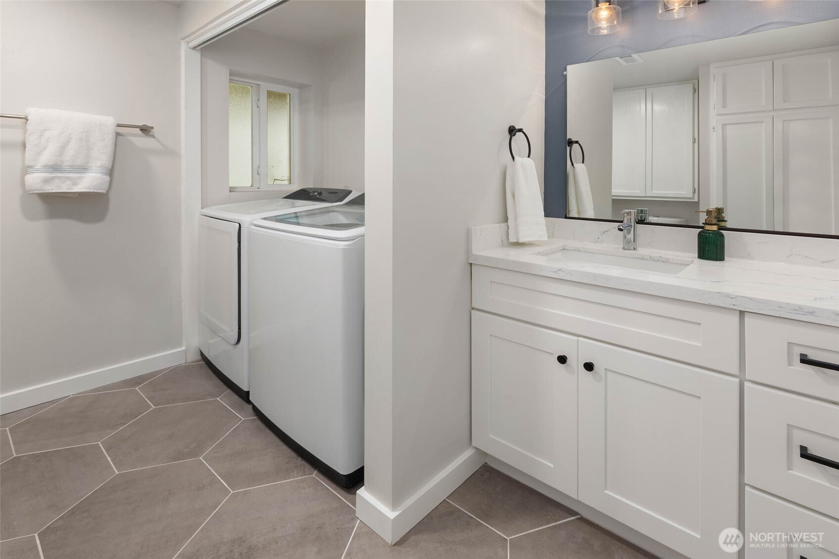 11019 23rd Drive Southeast Everett, WA 98208 - Photo 28 of 35 a bathroom with a sink and mirror