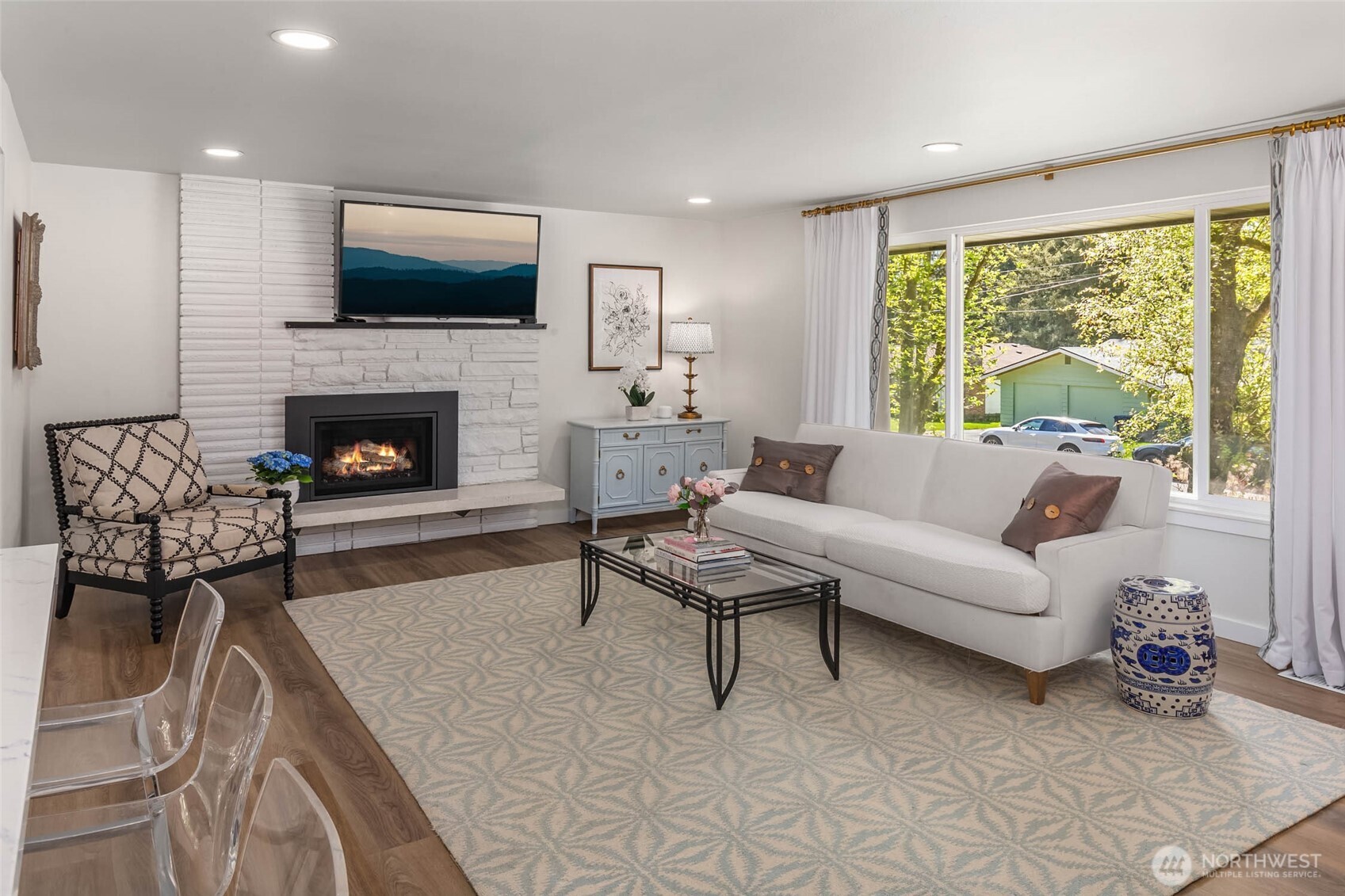 11019 23rd Drive Southeast Everett, WA 98208 - Photo 8 of 35 a living room with furniture and a fireplace
